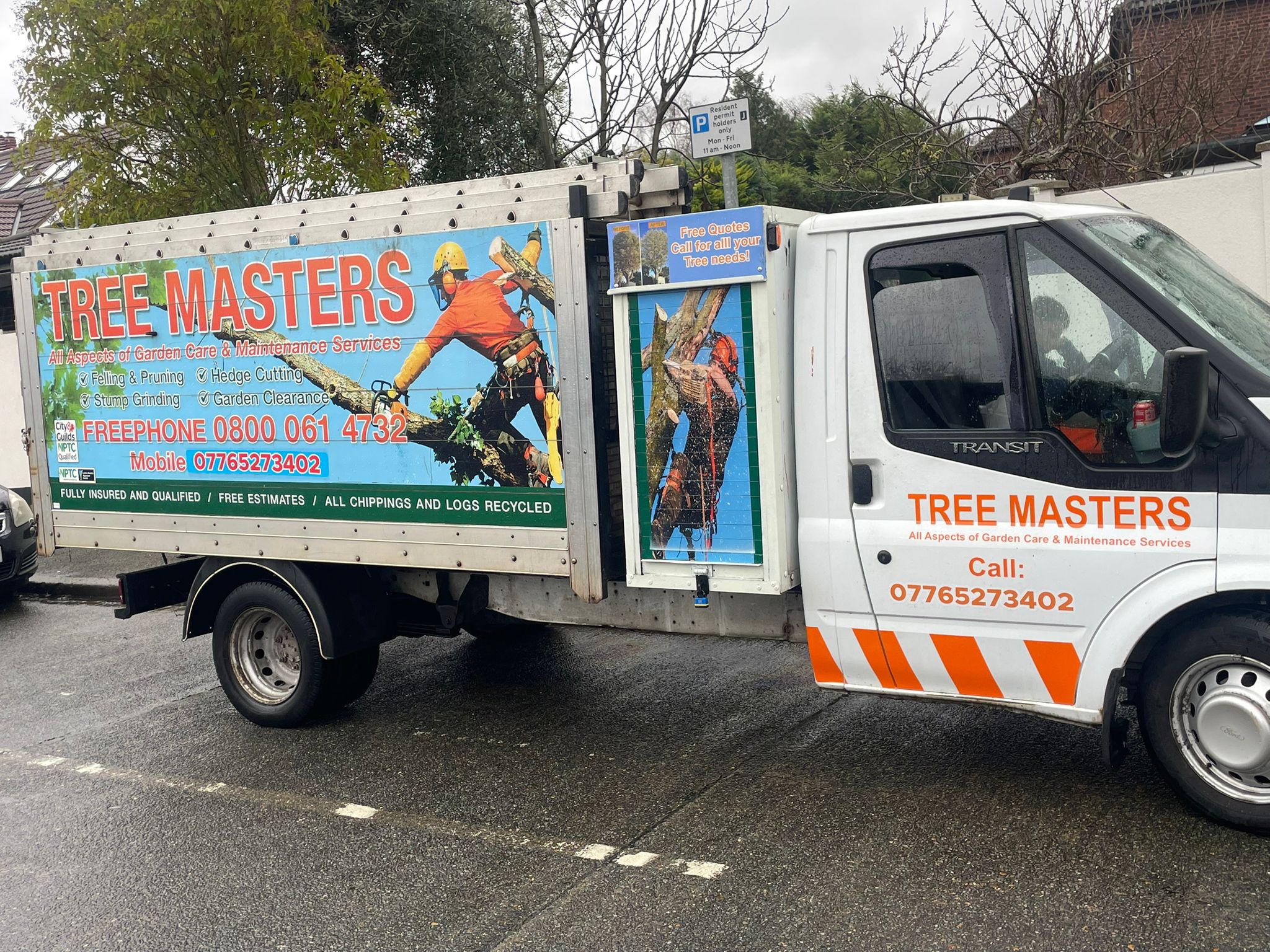 Tree Masters vehicles and team on site